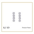 Ezra Dangling Earrings in Rhodium