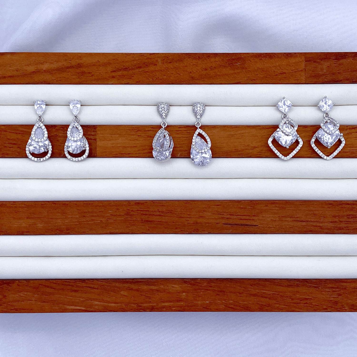 Eli, Emberly & Enylle in Rhodium