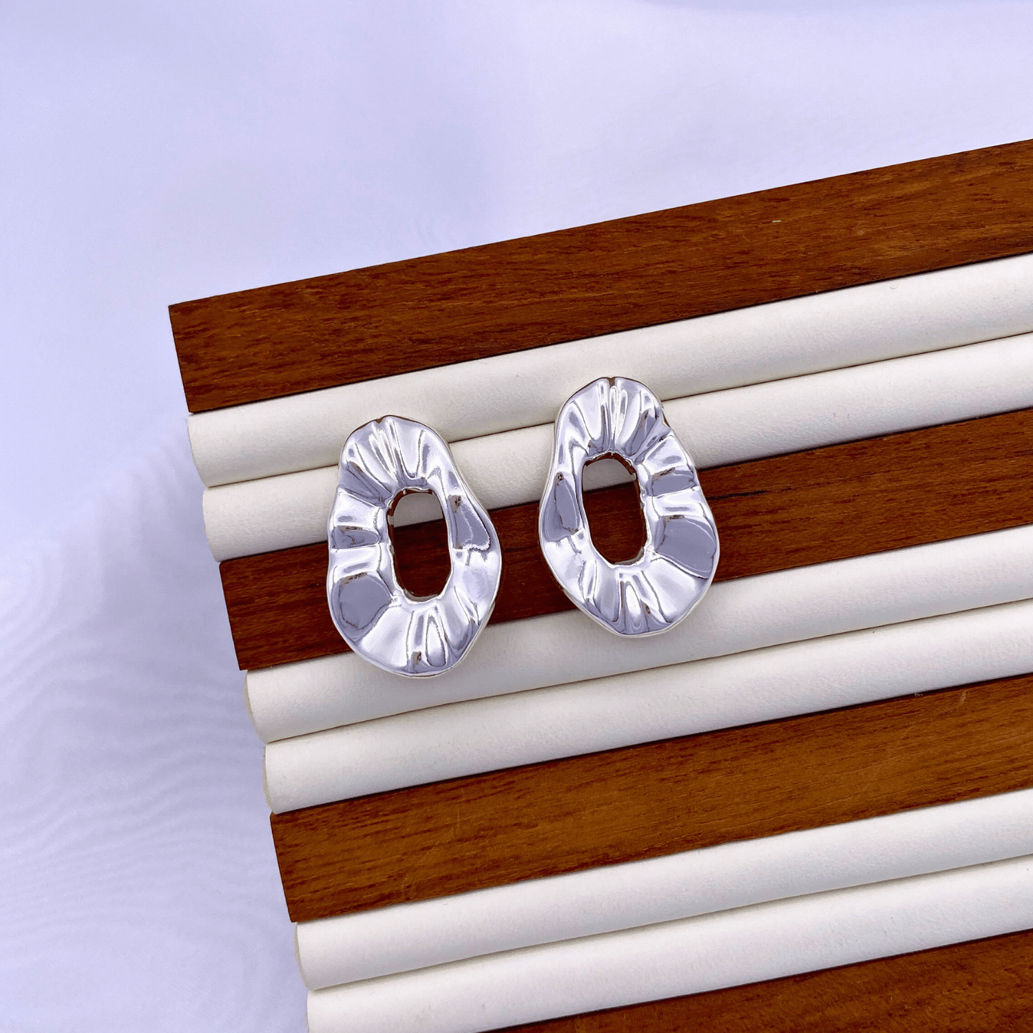 KLAD-C005 Earrings in Rhodium