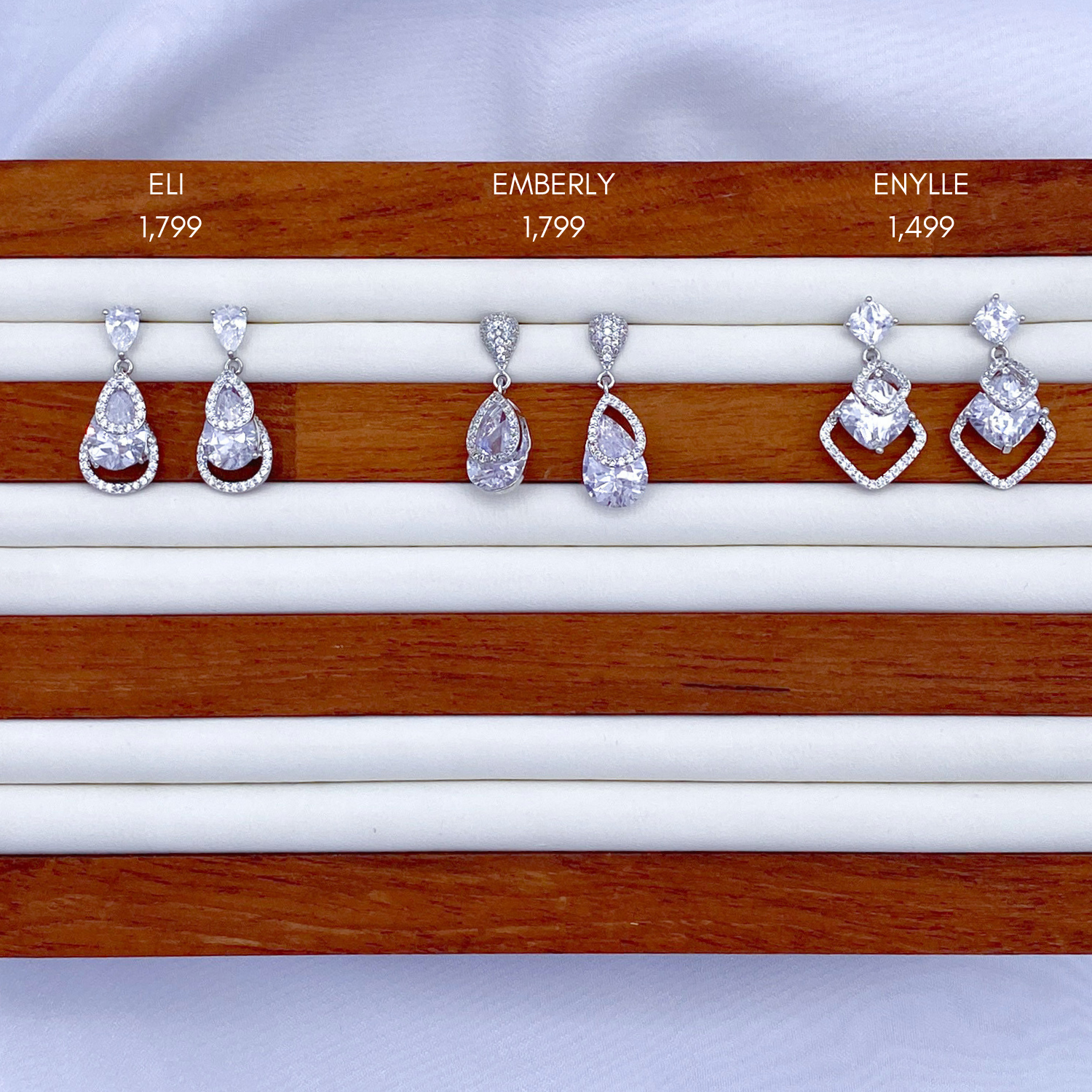 Eli, Emberly & Enylle in Rhodium