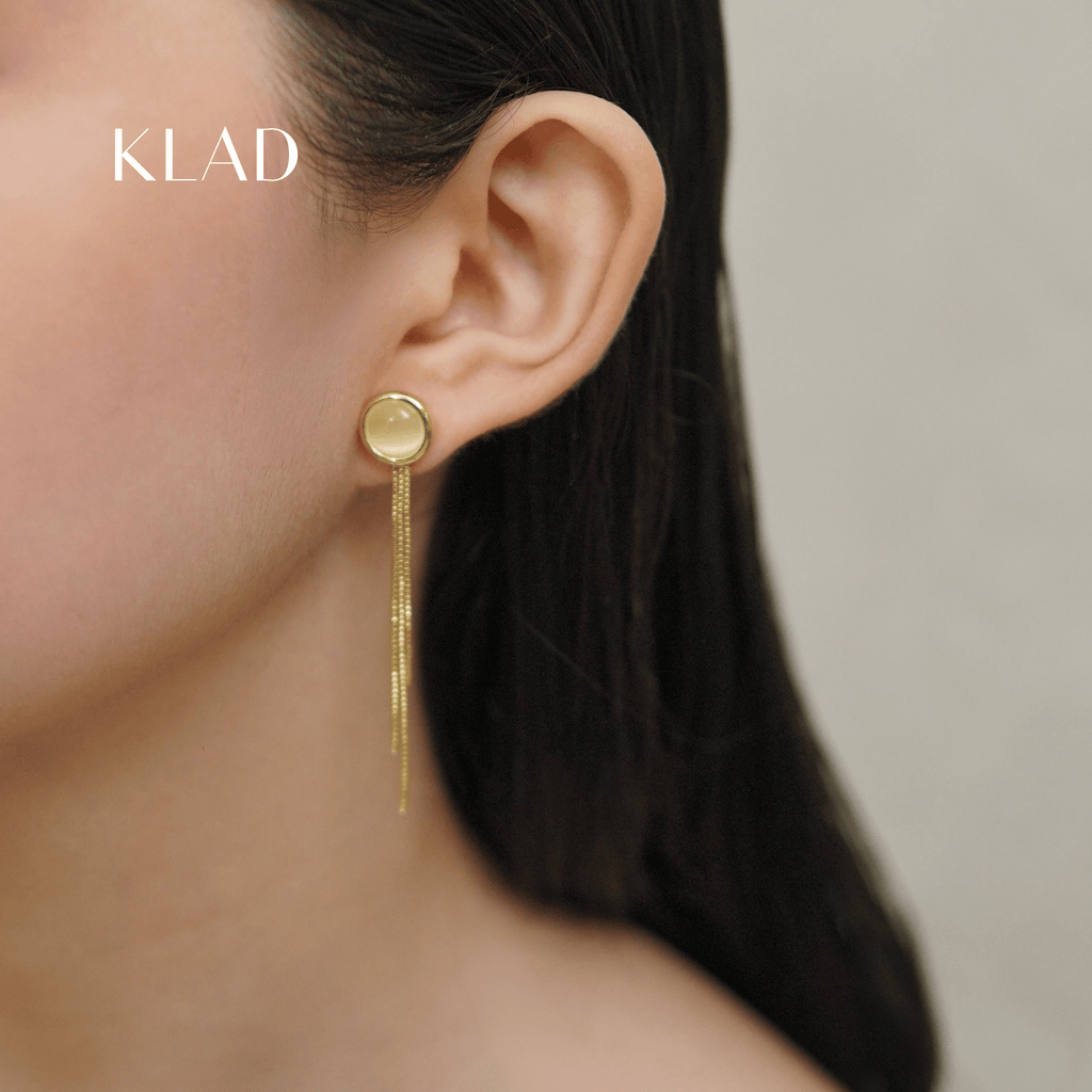 Cyralis Dangling Earrings in Gold
