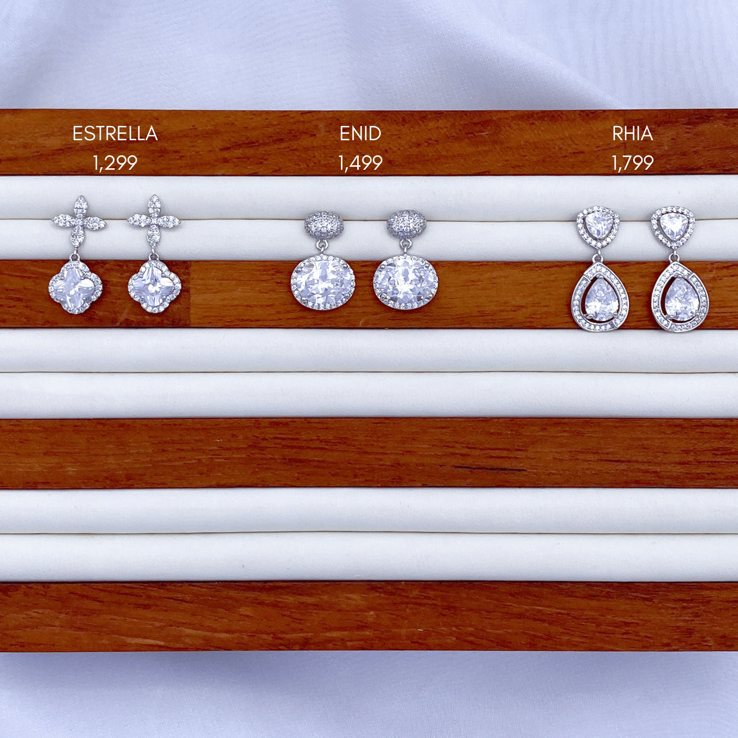 Estrella, Enid & Rhia in Rhodium