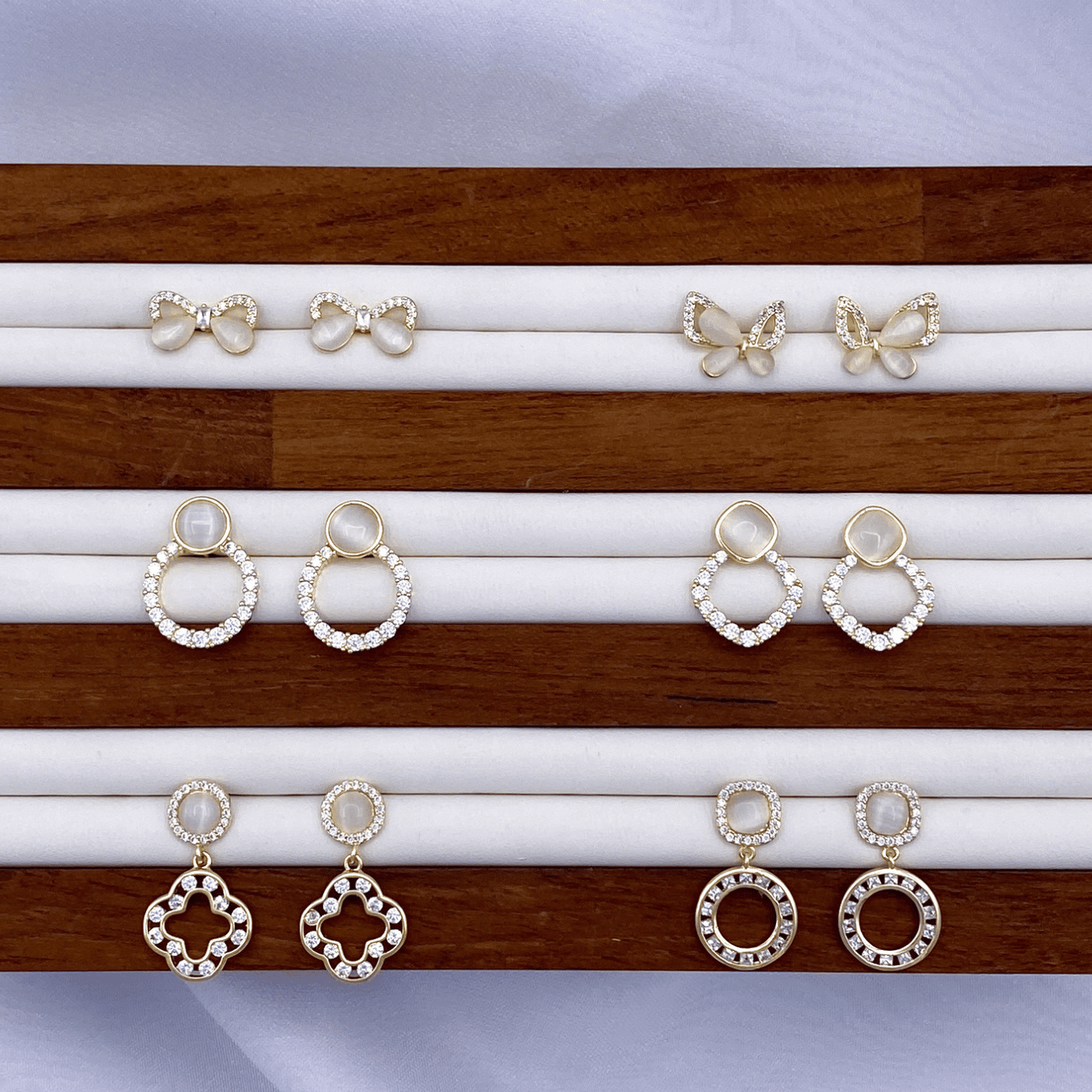 erielle, etta, eileen, eyanna, evanna & elia earrings in gold