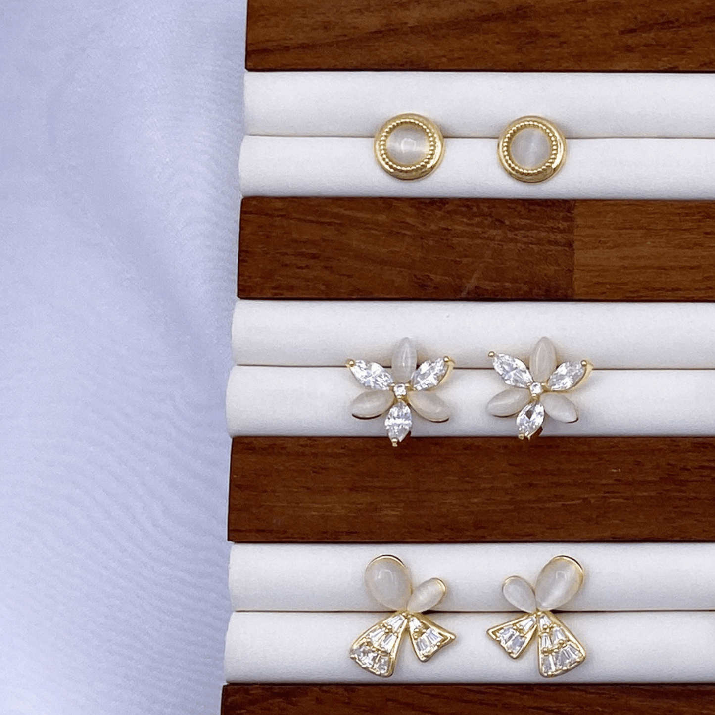 elle, eva & eleanora earrings in gold