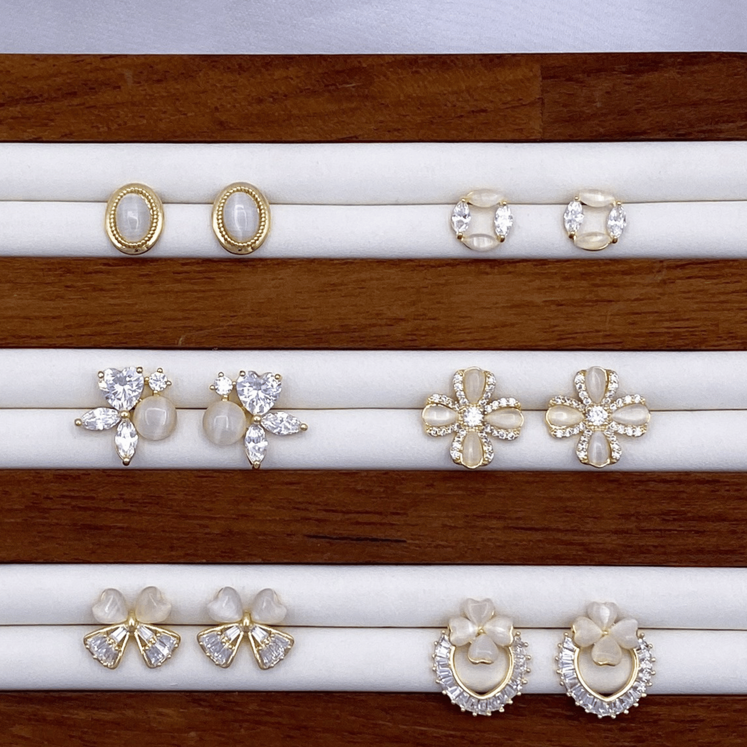 Elliope, Emeline, Evalina, Eisther, Erich & Erin Earrings in Gold