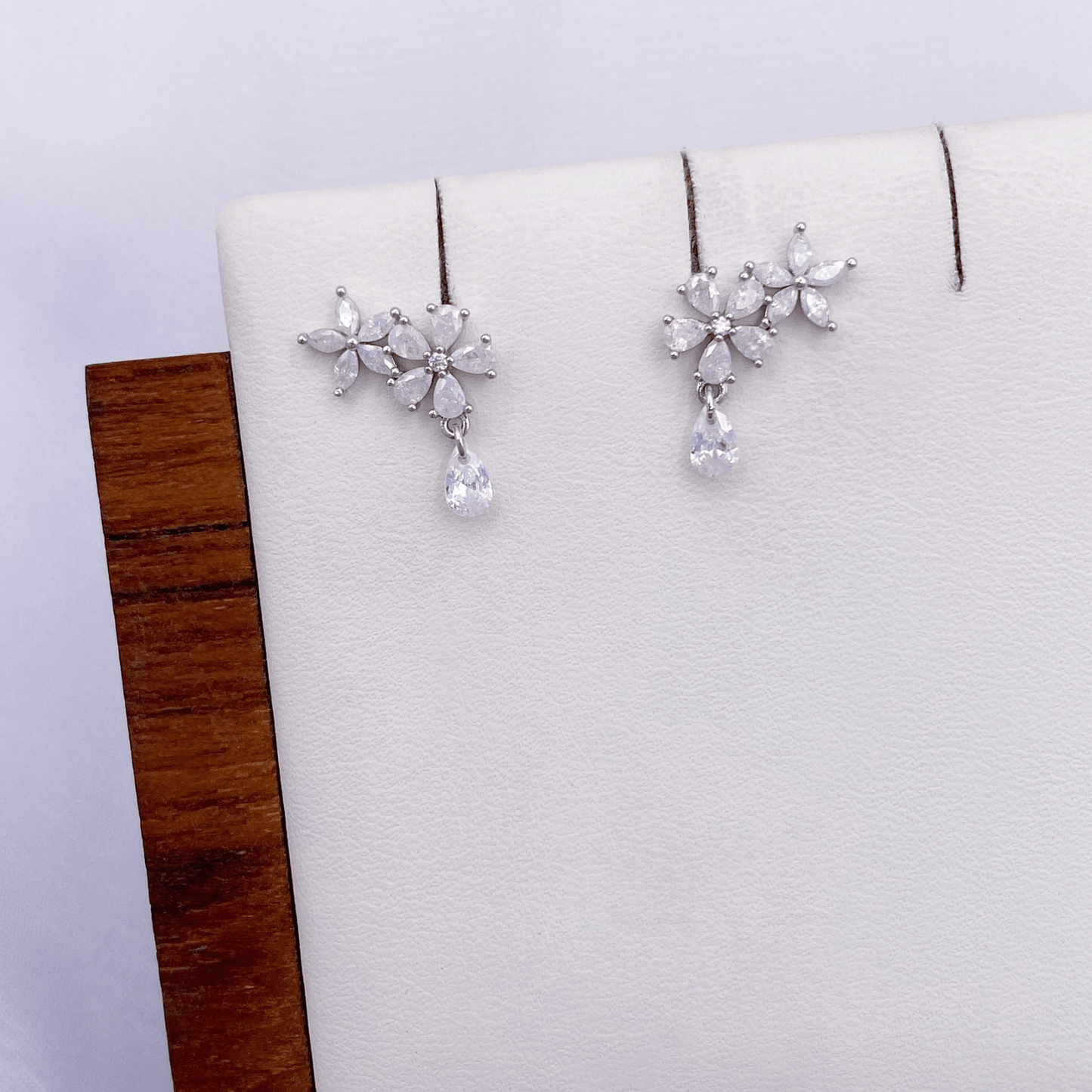 jionni earrings in rhodium