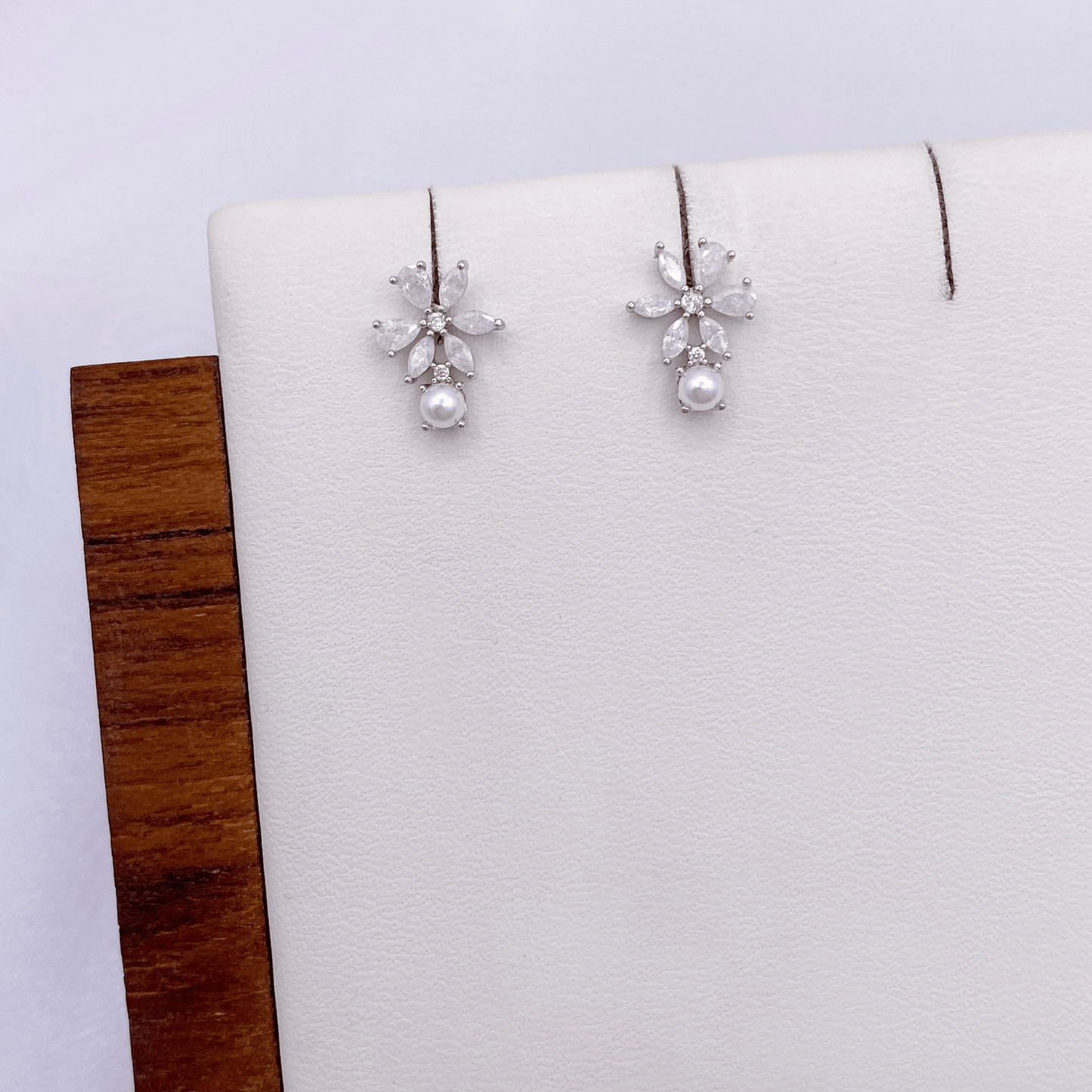 jynessa earrings in rhodium