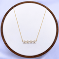 Kaira Necklace in Gold