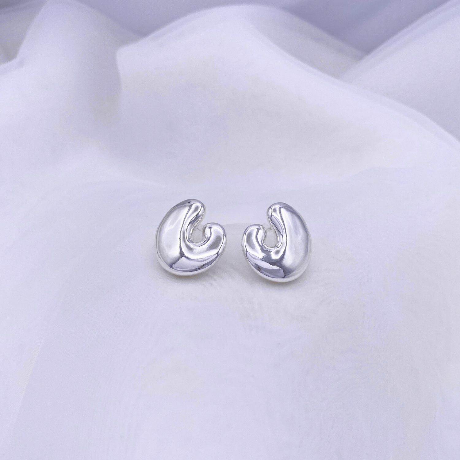 KLAD-C004 Earrings in Rhodium