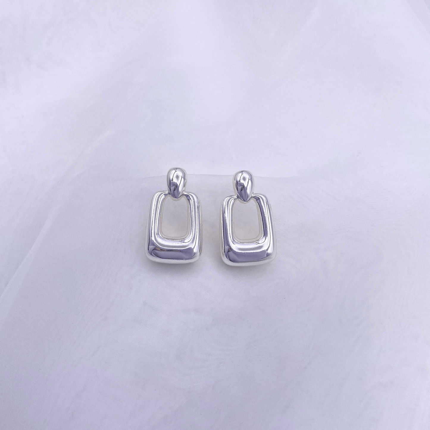 klad-c006 earrings in rhodium