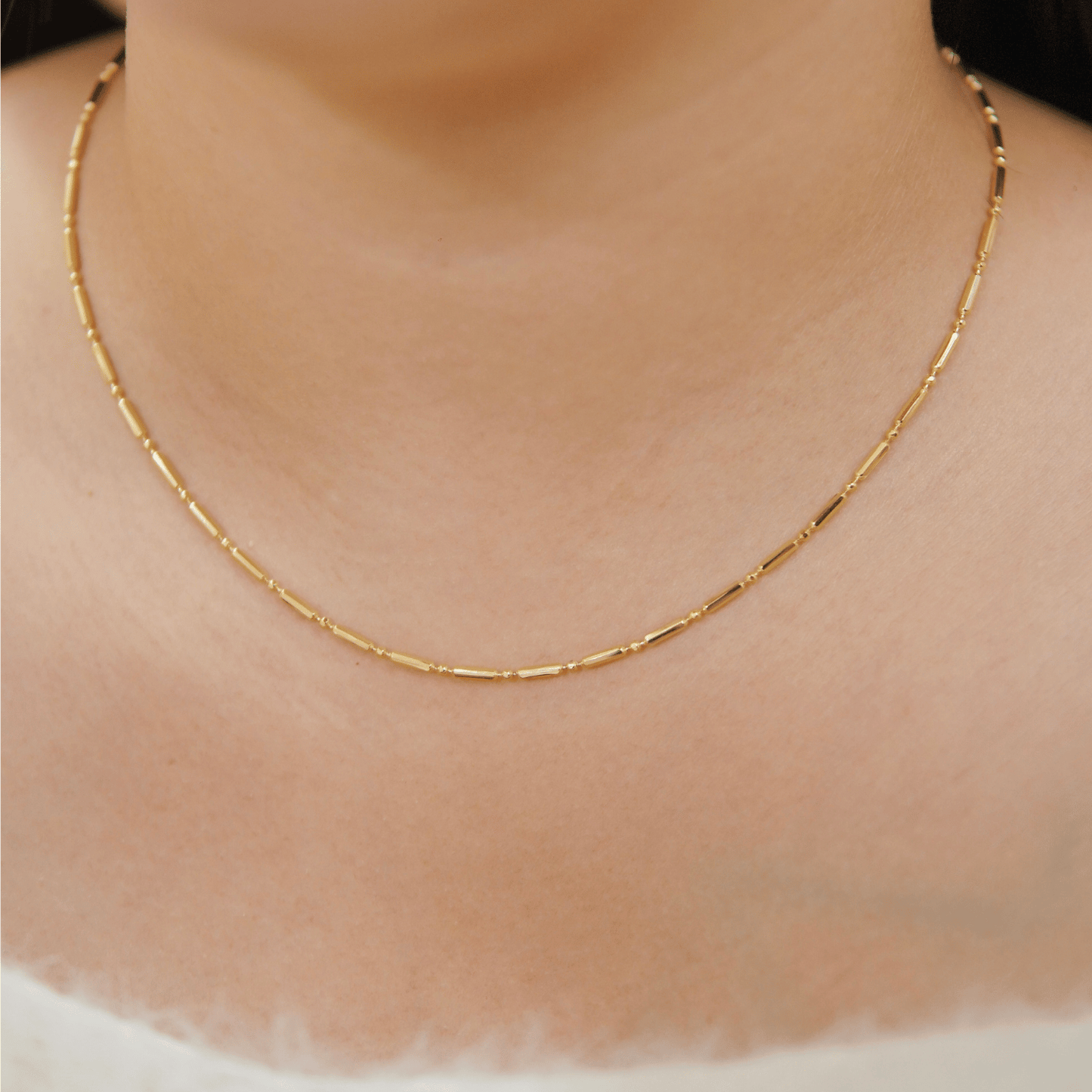 xerina necklace in gold