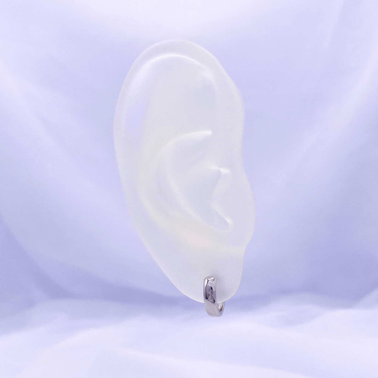 xiora hoop earrings in rhodium