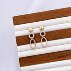 Xyliana Dangling Earrings in Gold