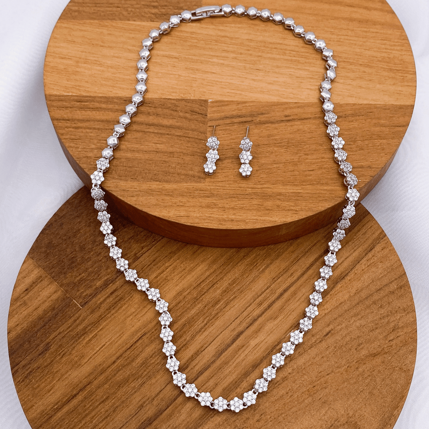 zinnia set in rhodium